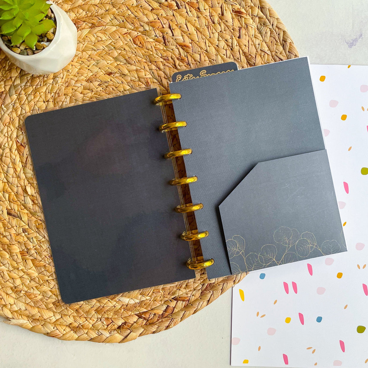Cuaderno Discos negro con hojas